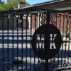 wrought iron gate with family initials