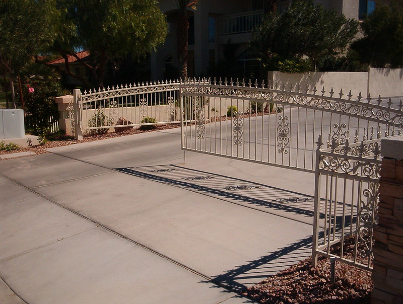 swinging metal driveway gate