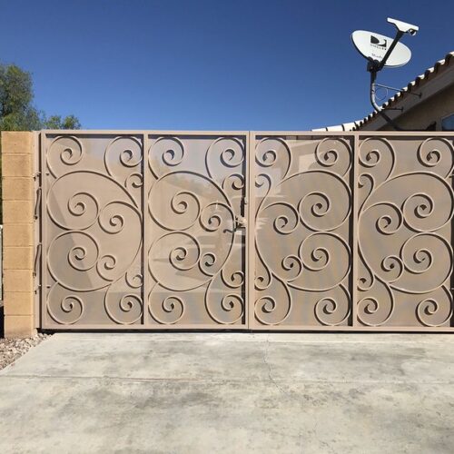 ornamental driveway gate with swirls